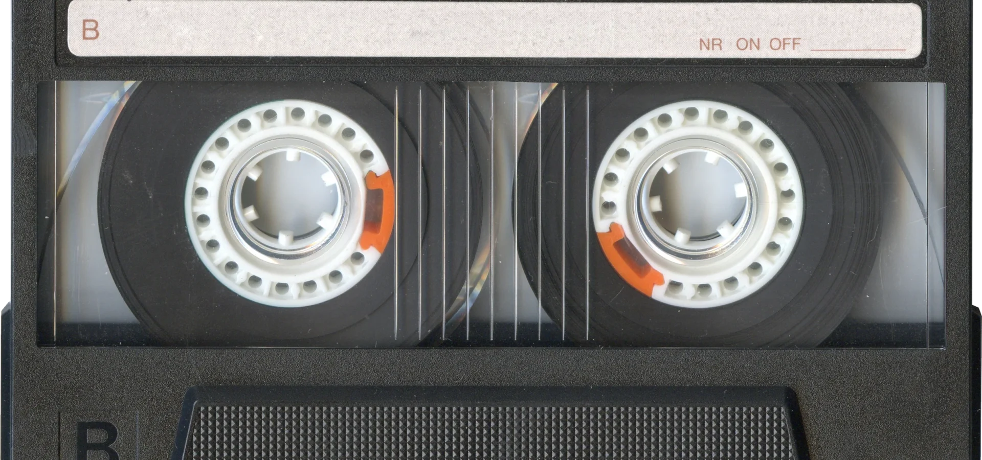 Sony HF-S90 cassette tape with dual reels and orange safety tabs visible against black casing.